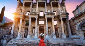 Tourist standing in front of Ephesus temple