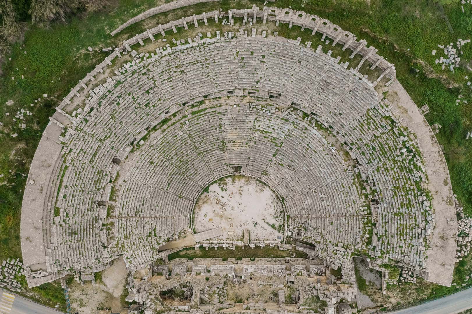 Aerial view of Ruins of theater in ancient city. UNESCO world heritage in Turkey. Ruined ancient city in Europe. Popular tourist destination.